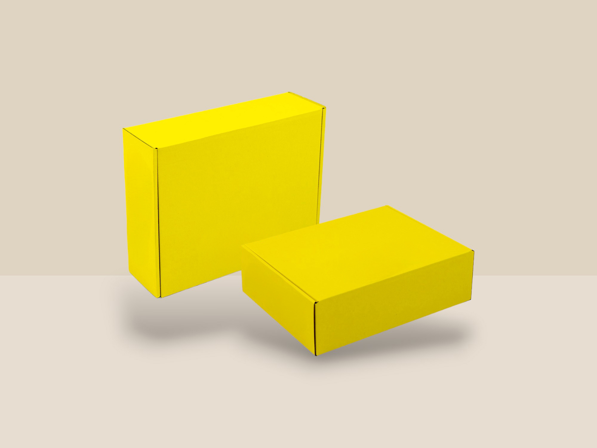 boite en carton avec cales de couleur jaune pour emballer des produits destinés au e-commerce