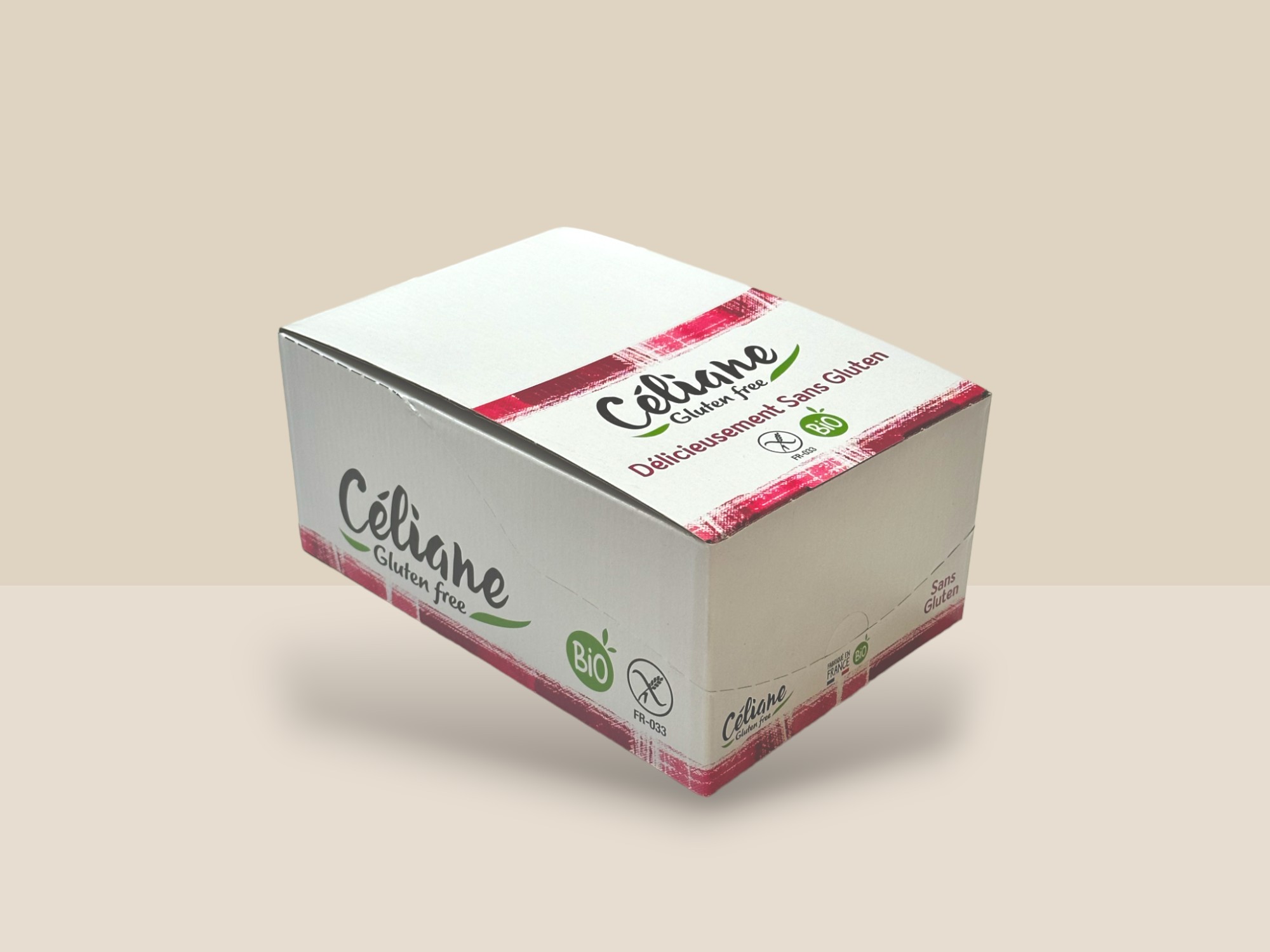 Prêt à Vendre fermé de couleur rose et blanc, mettant en avant un design attrayant et coloré sur lequel figure le logo Céliane et le logo BIO.